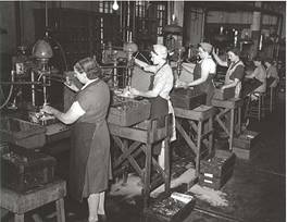 During World War II, women took jobs in area factories by GrandRapidsPublicLibrary.